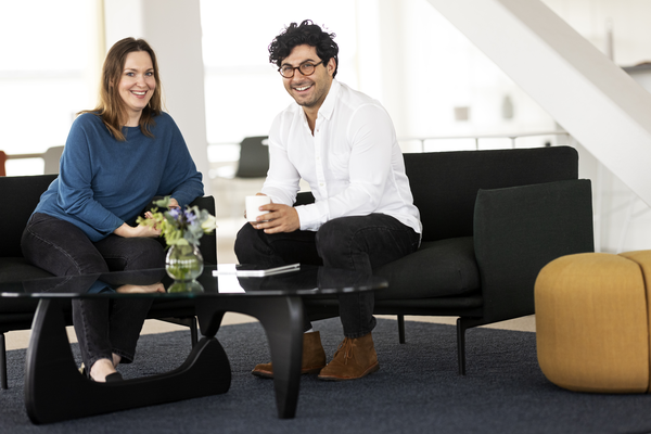 people talking in armchairs