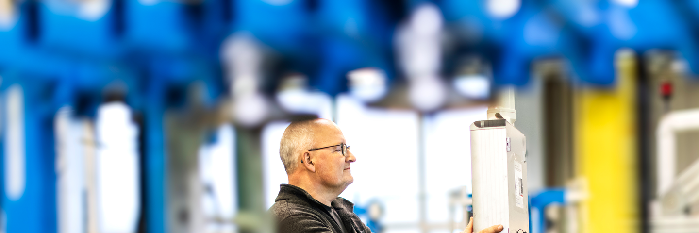 Factory, ventilation, man looking at control panel, circular production, Manufacturing of pessed bend BU